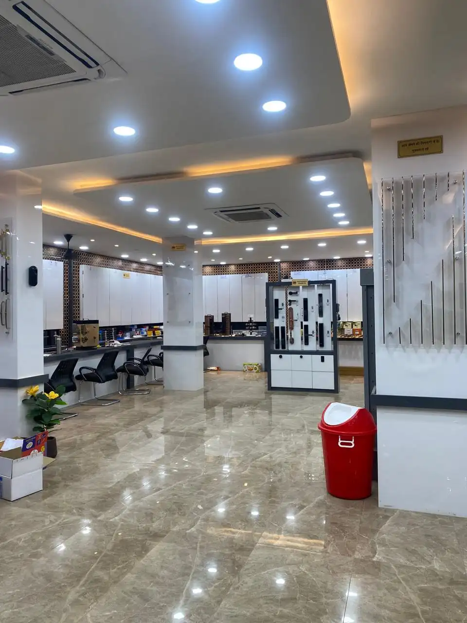 Hardware section of the showroom with lock displays and handle walls