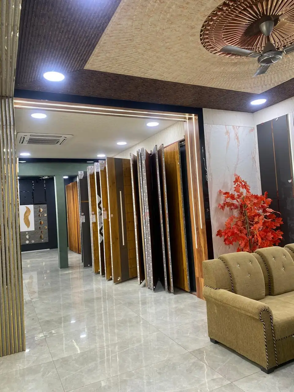 Door display hall inside the showroom with flip-through racks and seating