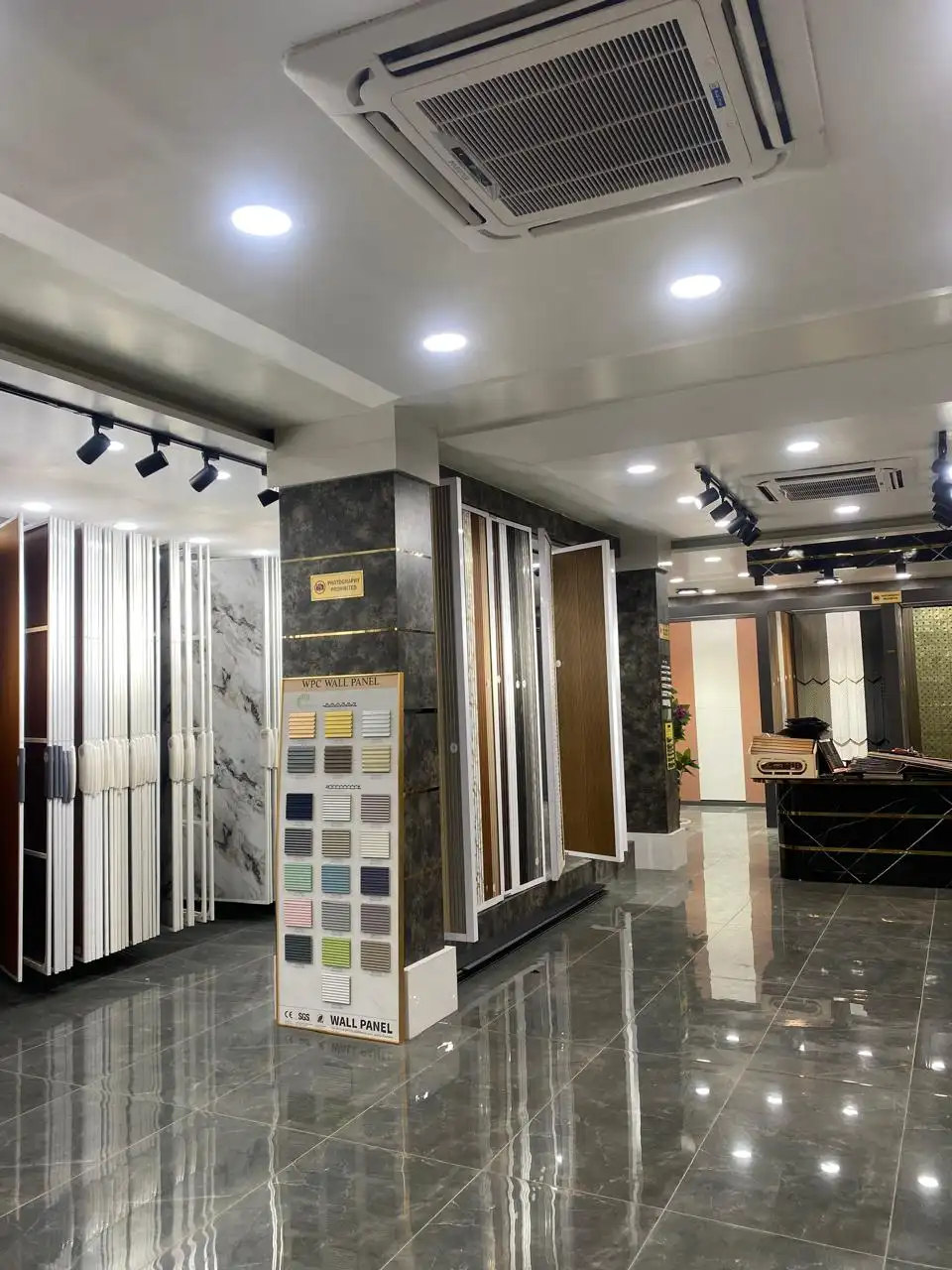 Wall-panel and laminate displays inside the showroom