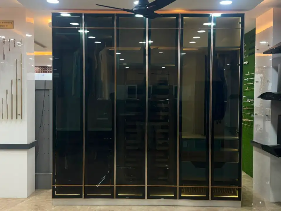 Black glass six-door wardrobe display unit in the showroom